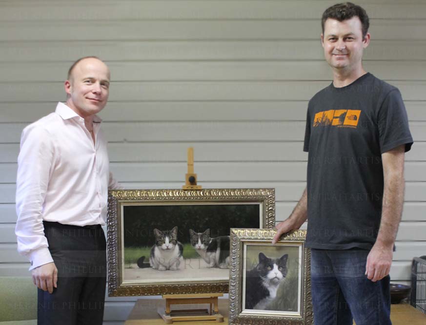 Alan and Nicholas with the oil portraits of Milly, Molly and Purdy