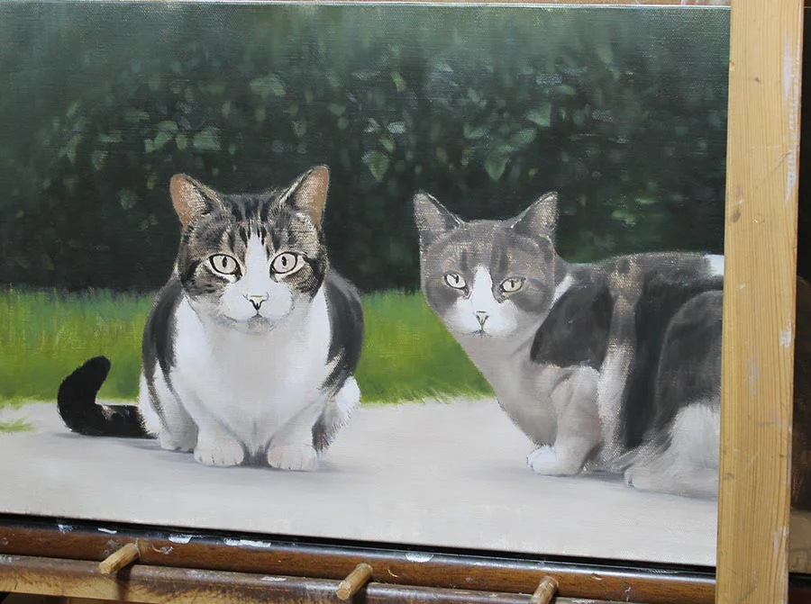 Framed oil portrait of Milly and Molly, showing the full artwork in its new home.