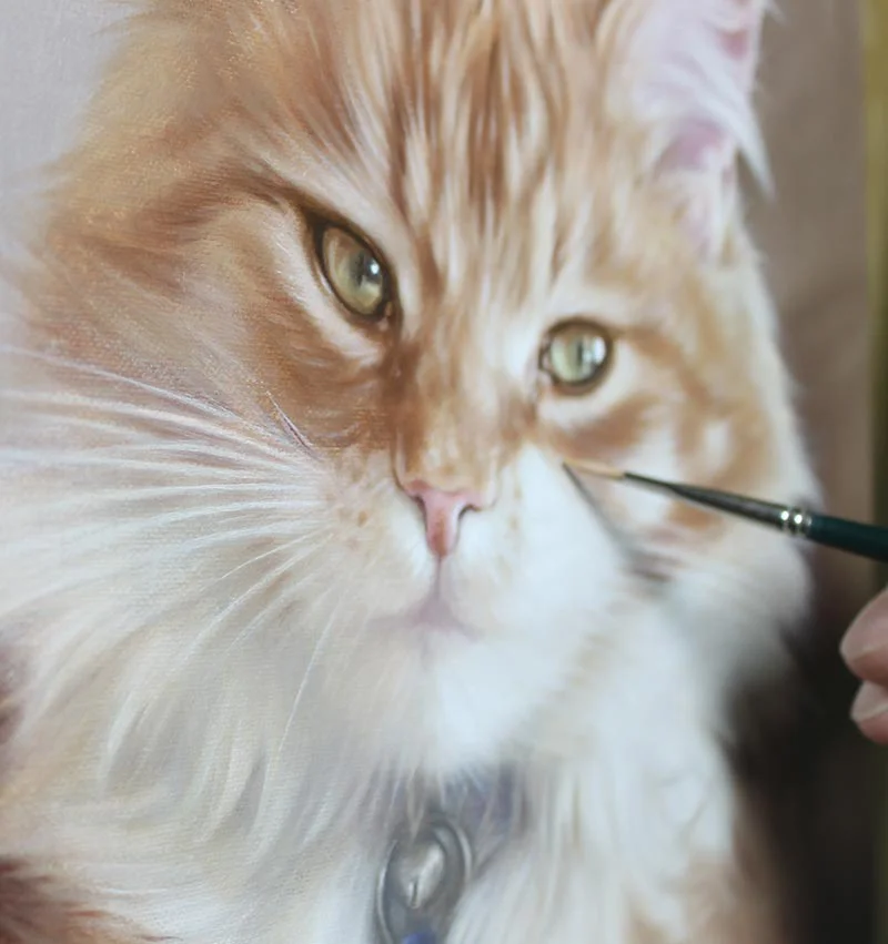 Dudley's cat portrait in oils, showing the painting in progress on the easel.