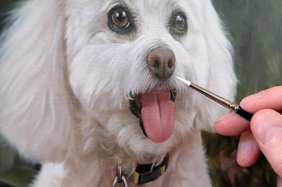 Detailed close-up view of Lulu's oil portrait showing brushwork texture on her white fur and facial features.
