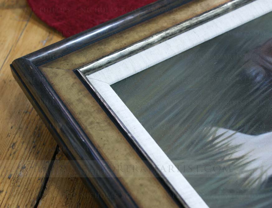 Close up of the frame and painting
