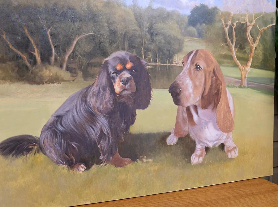 Classic Work on Dogs in Landscape Portrait Classic oil work on two dogs, Bilbo and Mr Kipling, within their landscape portrait, showing refined details.