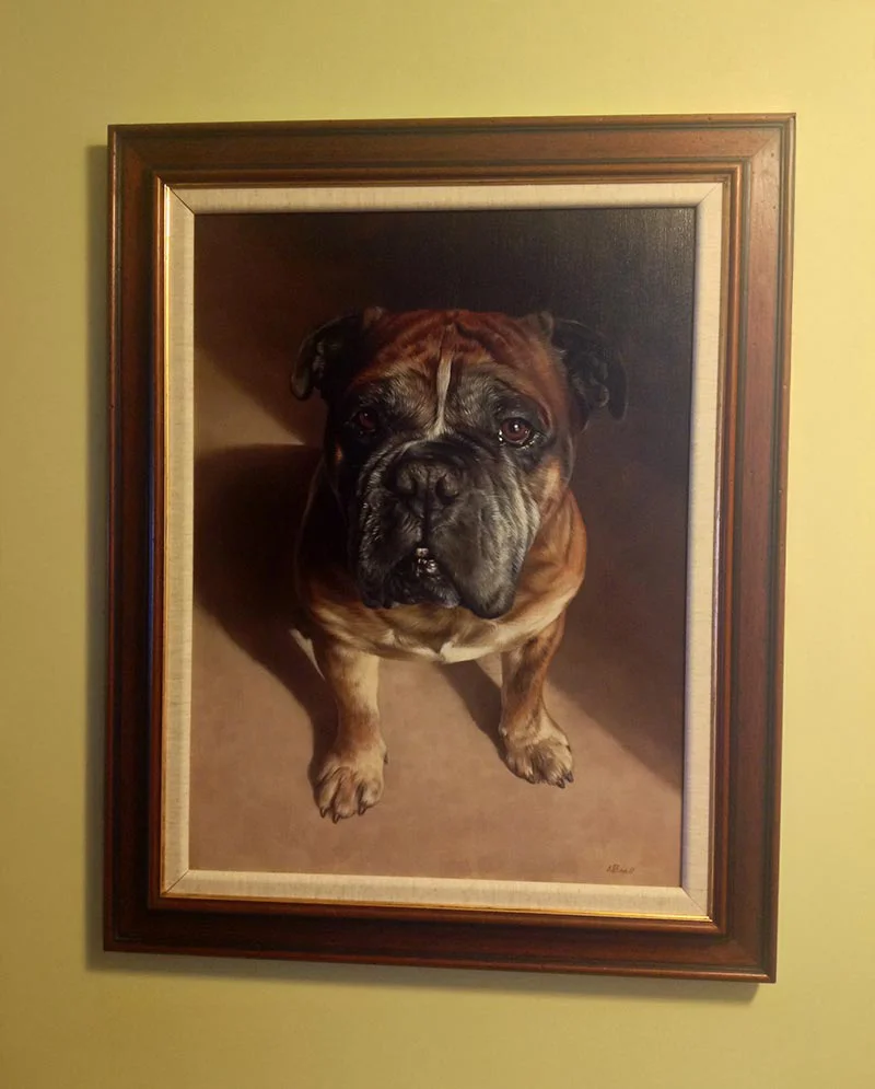 Client with their Dog Oil Portrait Client Kristian with his framed oil portrait of Boomer the dog.