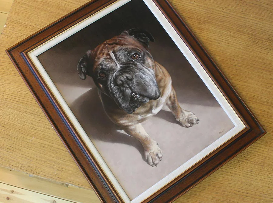Dog Oil Painting Displayed Framed Boomer’s dog oil painting displayed framed with a painter's brush for scale.