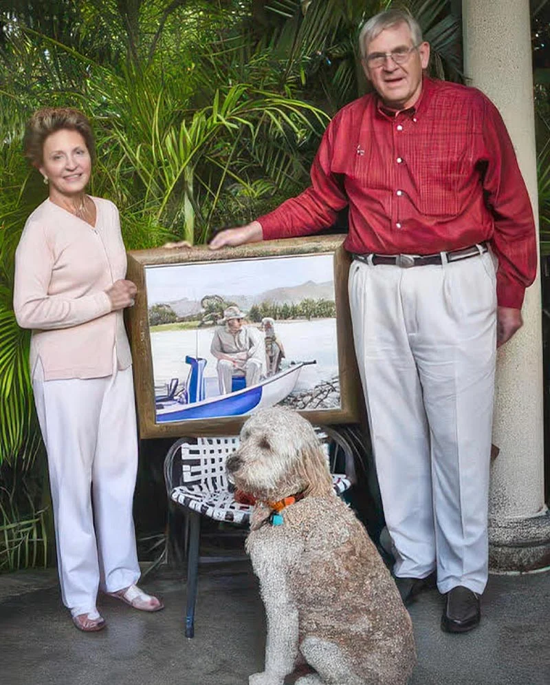 Happy Clients Holding Landscape Dog Portrait