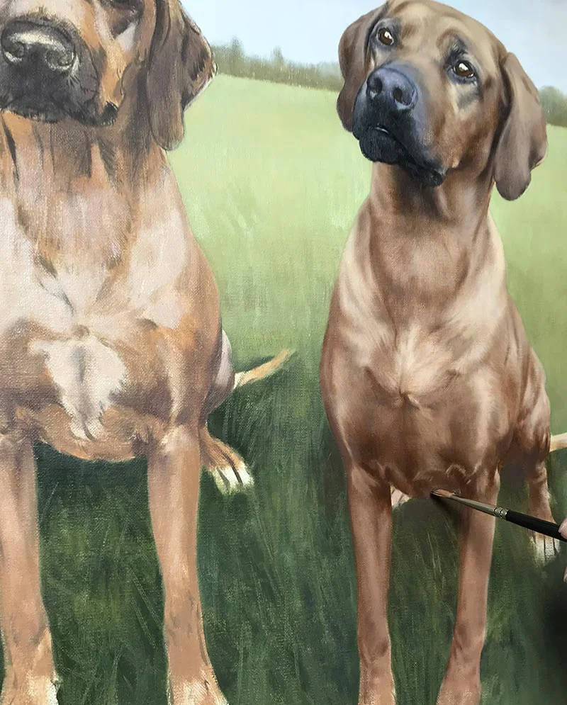 Adding Texture and Colour – Dog Oil Painting, enhancing realism Artist adding texture and color to the oil painting of the two Rhodesian Ridgebacks