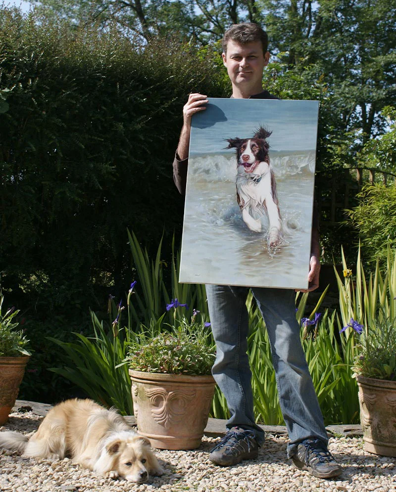 Portrait of Spaniel with Artist Nicholas Beall Portrait of Banjo the Spaniel displayed alongside artist Nicholas Beall, showing scale and detail.