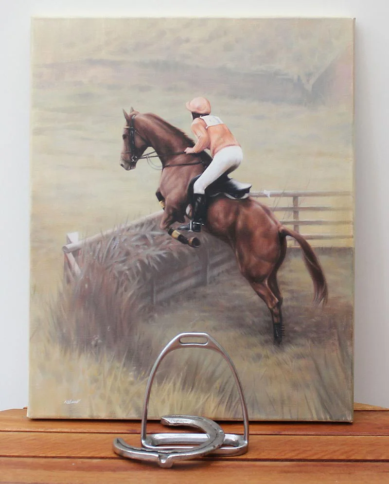 Client with Horse Jumping Portrait Client Lynne Furniss holding the finished horse jumping portrait of Frizbee.