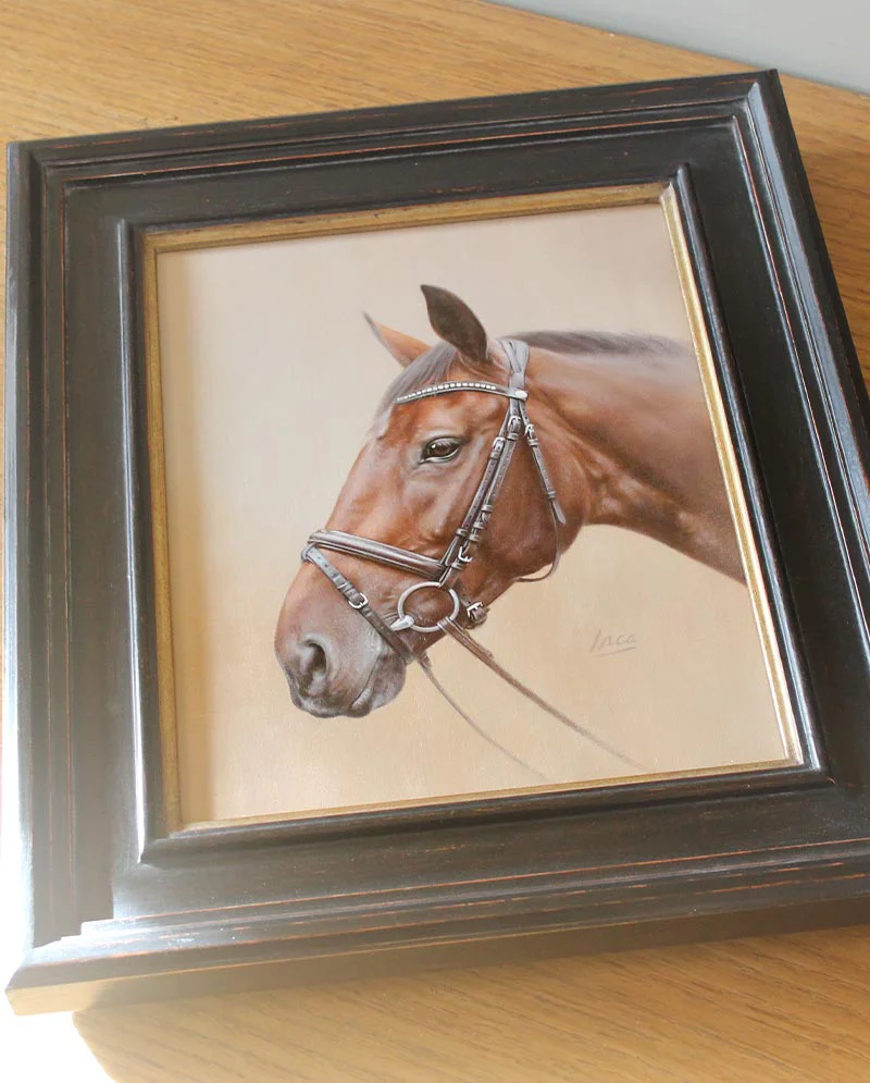Inca’s Portrait Framed and Displayed Inca’s horse portrait framed and displayed in a home setting.