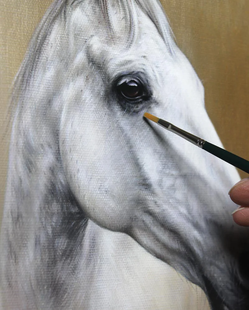Close-up detail of the oil painting of Artu the horse in progress, highlighting the rendering of his fur and eye.