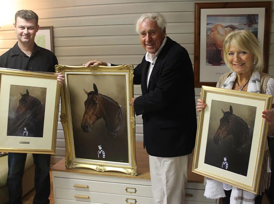 Client with Framed Horse Oil Portrait, a happy moment Client joyfully holding the framed oil portrait of their horse
