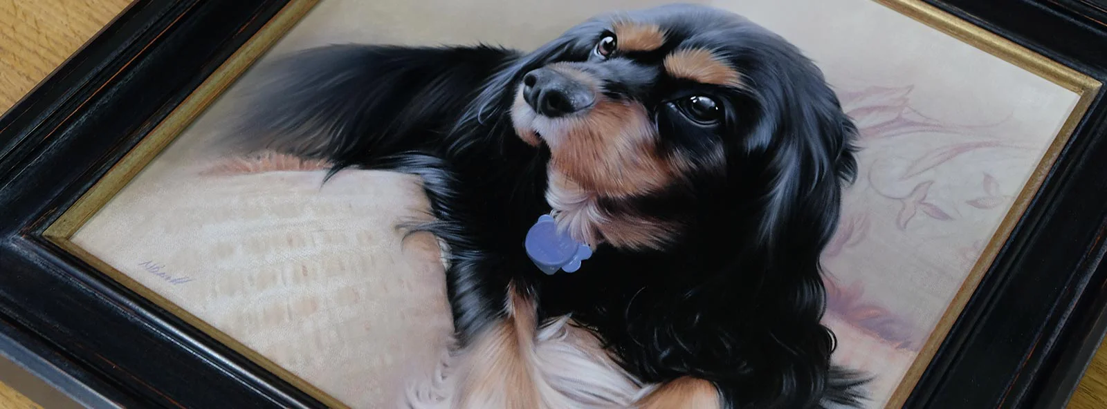 View more framed dog oil portrait commissions by Nicholas Beall A close-up of a framed oil portrait of a Golden Retriever, showcasing the texture and detail of the painting.