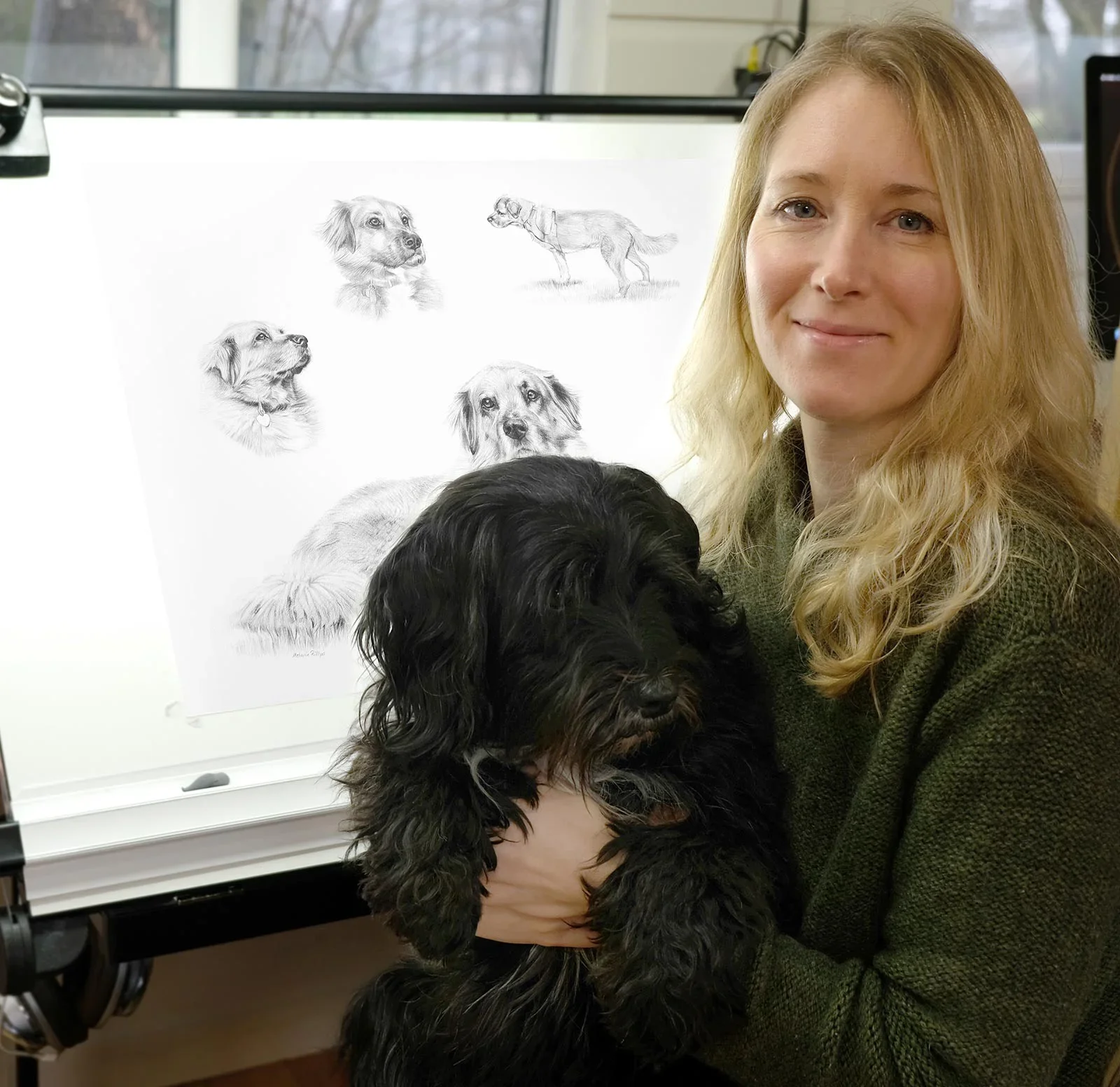 Life Story Pet Drawings Gallery - Capturing precious memories by Melanie Phillips Melanie Phillips with her heartwarming Life Story pet drawings showing beloved pets in multiple tender moments