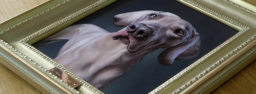 Explore more traditional oil pet portrait commissions by Nicholas Beall A serene outdoor setting featuring an elegant display of framed traditional oil pet portraits by Nicholas Beall, blending art with nature.