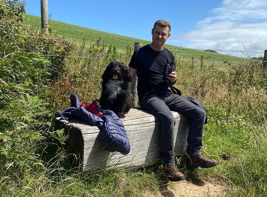 Nicholas Beall enjoying a summer walk along the scenic Welsh coast.