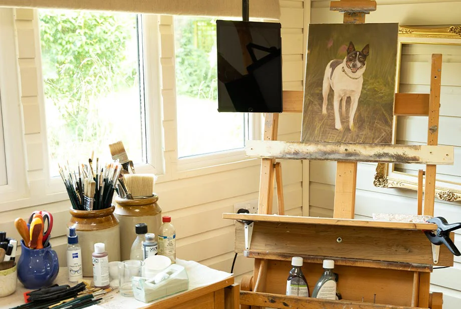 Nicholas's Painting Easel and Oil Painting Setup Nicholas's painting workstation in the studio, showing his easel, an oak kitchen trolley with oil paints, brushes, and mixing tools.