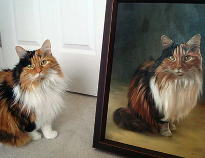 Nicole Blanton's Testimonial for Her Cat's Portrait Nicole Blanton's cat sitting beside its portrait, which perfectly mirrors its pose and captures every hair, described as 'stunning'.