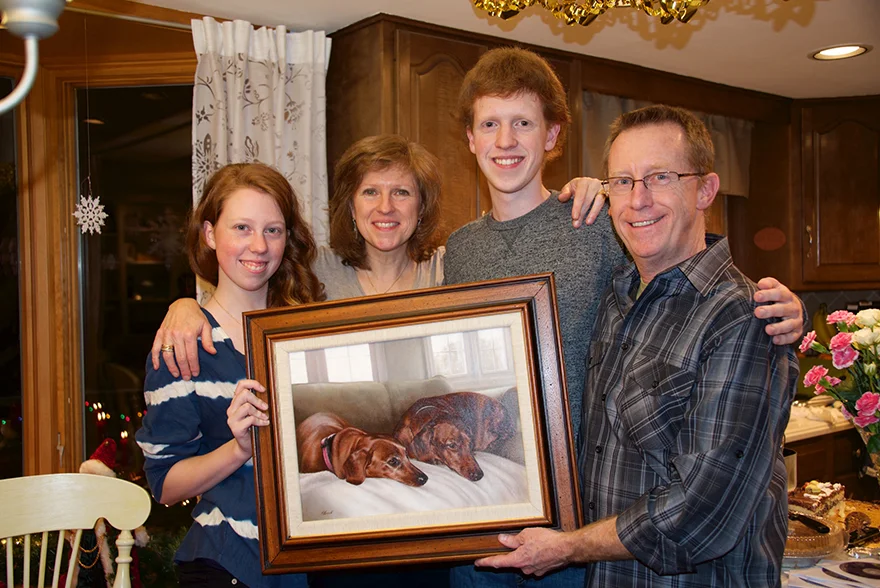 Kris Fitzpatrick's 50th Birthday Portrait Surprise Kris Fitzpatrick and her family on Christmas Eve, celebrating her 50th birthday with the unveiling of a magnificent oil painting featuring her beloved dachshunds and their home.