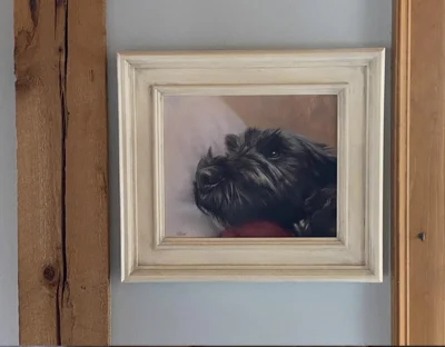 Mike's Testimonial for Lottie's Portrait Lottie's portrait displayed beautifully in a newly redecorated room, highlighting its fantastic appearance.